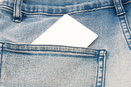 The business card form in a pocket of jeansの写真素材