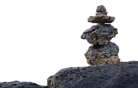 Rocks stacked and isolated on whiteの写真素材