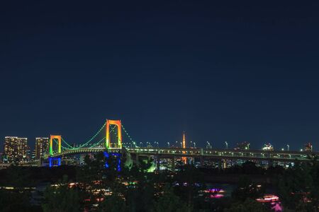 View of Tokyo Bay, Rainbow bridge and Tokyo Tower landmark, Night scene, Odaiba, Japanのeditorial素材