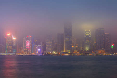 Hong Kong city skyline at pier over Victoria Harbor, Twilight sceneの写真素材