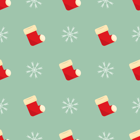 Seamless cute pattern with christmas socks and snowflake on blue background.の写真素材