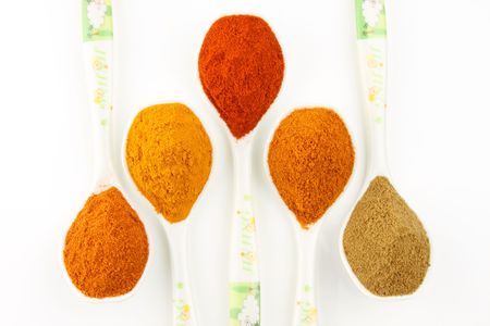 Pound spicy ingredients arranged on the spoons