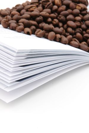 Coffee seeds on bookの写真素材