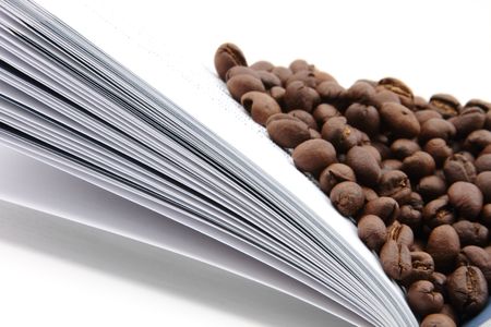 coffee seeds on bookの写真素材