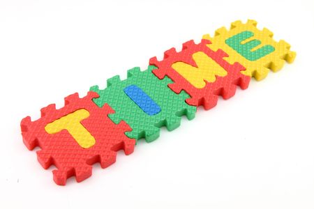 TIME word arranged in alphabet puzzleの写真素材