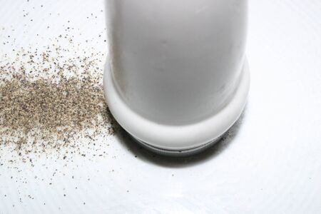 Shaker with pepper on white backgroundの写真素材