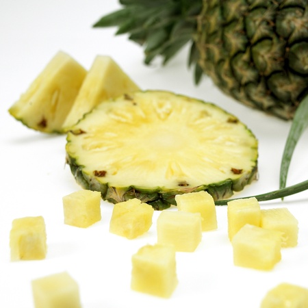 pineapple with slicesの写真素材