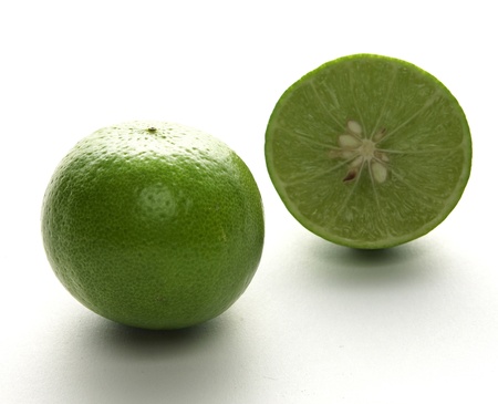 Fresh limes Isolated on whiteの写真素材