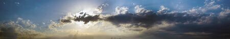 Stretched sky with clouds at sunset.