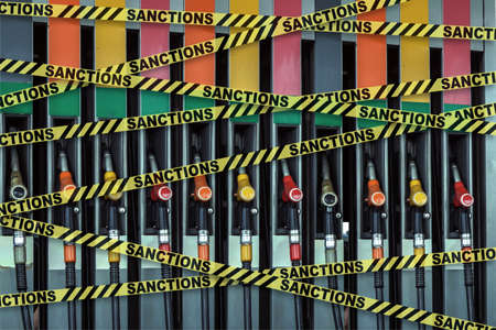 gas station. Tape with the words sanctions.