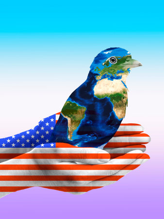 A bird from the world. The globe is surrounded by the American flag. The concept of the importance of protecting the environment and the world we live in.の写真素材
