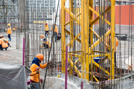 worker in the construction site working their own jobのeditorial素材