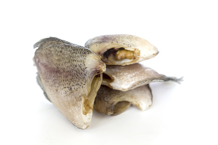 Dried fish ,thailand food preservation isolated on white の写真素材