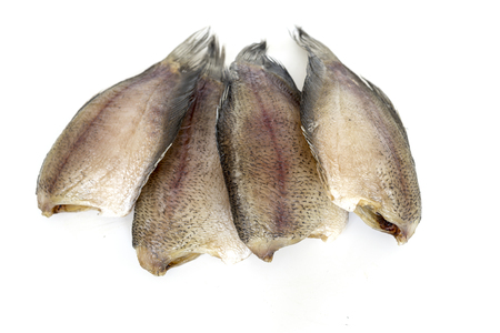 Dried fish ,thailand food preservation isolated on white の写真素材