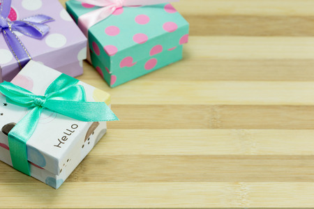 Gift boxes on bamboo backgroundの写真素材