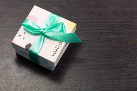 Gift box on wooden backgroundの写真素材