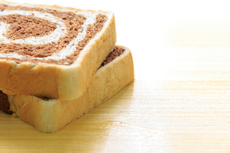 Slices  bread on a wooden tableの写真素材