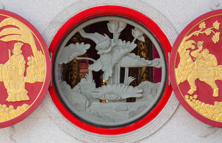 Lotus sculpture in circular windowの写真素材