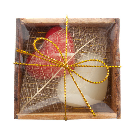 Romantic with heart in box wood isolated on white backgroundの写真素材