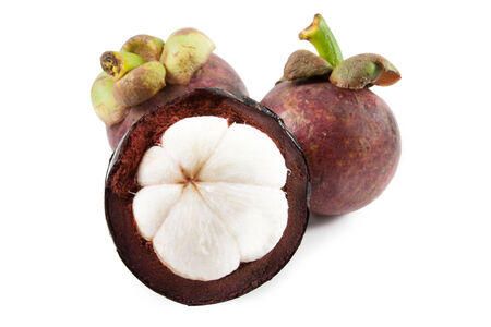 Mangosteens on white background.の写真素材