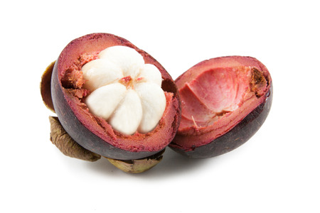 Mangosteens on white background.の写真素材