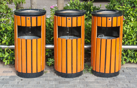Bins recycling bins public trash trash under the treeの写真素材