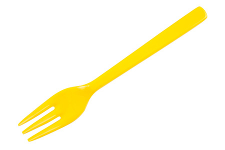 Yellow plastic forks isolated on white background, file includes a excellent clipping pathの写真素材