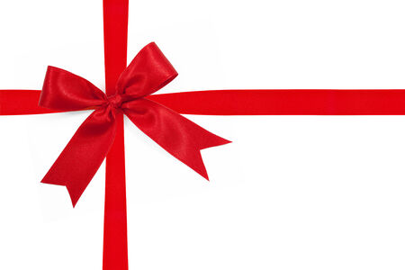 red satin gift bow ribbon isolated on whiteの写真素材