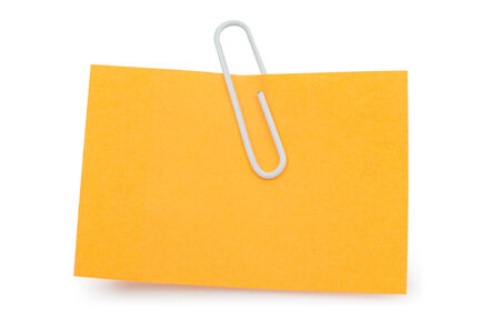 Orange Note with paper clip isolated clipping pathの写真素材