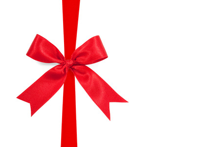 red ribbon bow on white background preparation for gift wrappingの写真素材