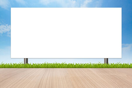 Banner advertising a large signs with isolated white space on blue sky.の写真素材