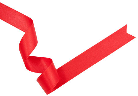 red ribbon nicely uncurled isolated on pure white preparation for gift wrappingの写真素材