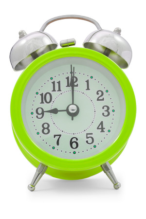 Green alarm clock isolated on white background,  file includes a excellent clipping pathの写真素材