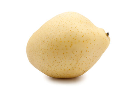 whole and cut pears on a white backgroundの写真素材