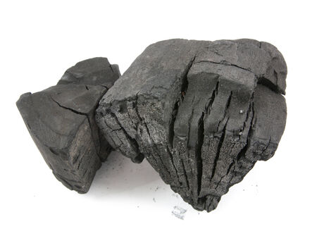 many pieces of charcoal isolated on white backgroundの写真素材