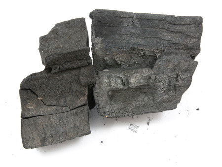 many pieces of charcoal isolated on white backgroundの写真素材
