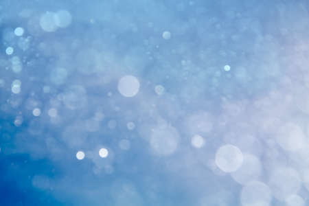 abstract circular blue bokeh backgroundの写真素材
