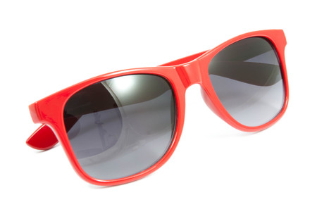 red sunglasses on white backgroundの写真素材