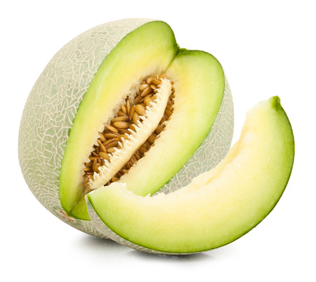 green cantaloupe melon isolated on whiteの写真素材