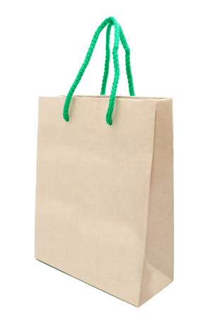 Brown paper gift bag  isolated on white backgroundの写真素材
