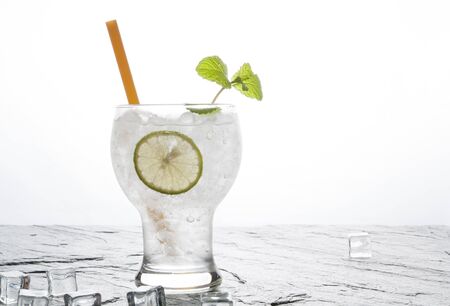 Soda lime drink with lime on stone backgroundの写真素材