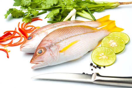 delicious portion of fresh fish fillet with aromatic herbs spices and vegetables healthy