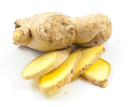 fresh ginger slide on white background