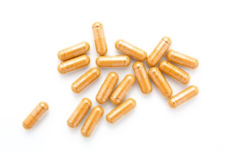 herb capsule on white backgroundの写真素材