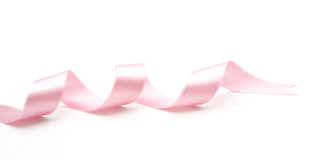 Pink ribbon bow in isolated on white backgroundの写真素材