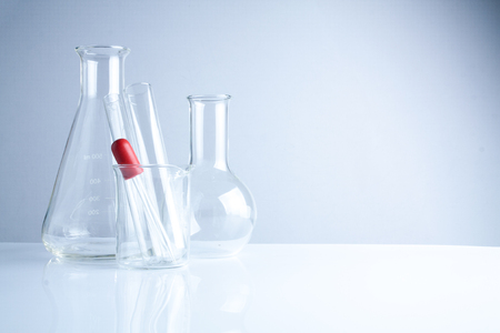 Group of laboratory glassware on table, Symbolic of science research.の写真素材