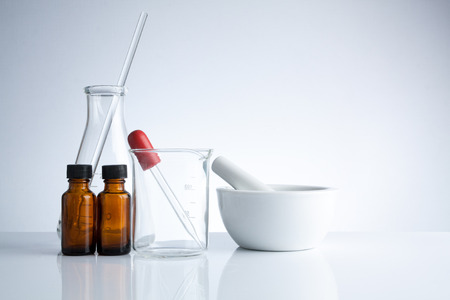 Group of laboratory glassware on table, Symbolic of science research.の写真素材