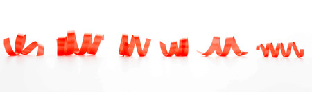 Red ribbon on a white backgroundの写真素材
