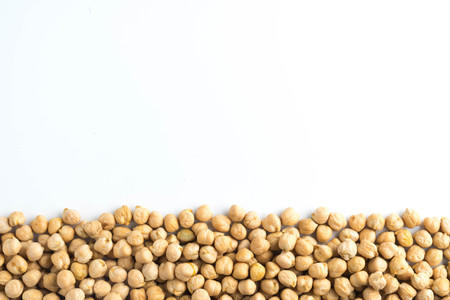 White beans on the white backgroundの写真素材