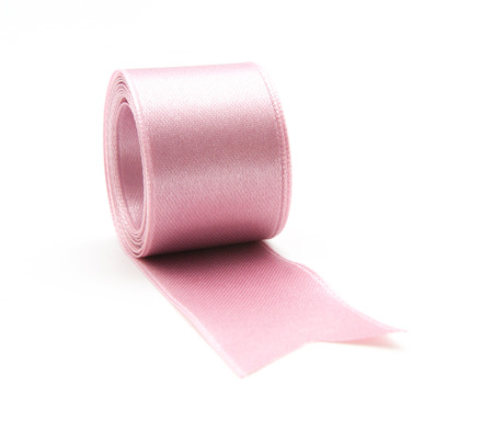 Pink ribbon bow in isolated on white backgroundの写真素材
